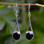 Long 925 sterling silver wishbone drop earrings with round Whitby Jet stones