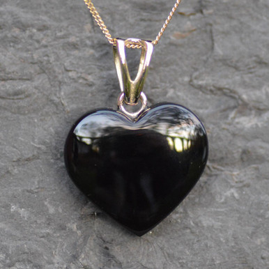 Whitby jet carved heart on yellow gold