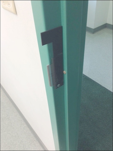 Rotated forward up and toward the door frame, stops the latch bolt from securing in the latch plate of the door frame. Allows locked door to be closed and opened all day, without unlocking or turning door knob.