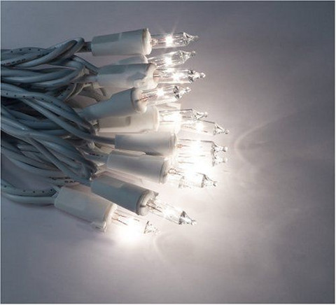 These white corded mini light strands come standard with 50 incandescent mini lights with six inch spacing. 

These white corded mini lights can also come in 100 light sets. 

Four inch spacing on the lights is also available in both 50 light and 100 light strands. 