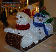 Three Snowchildren on the Sled.