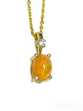 14K Yellow Gold - 7x5 - Oval Ethiopian Opal & Diamond Pendant & Chain