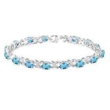 Sterling Silver - Oval Cut Blue Topaz & Diamond Accented Infinity Link Bracelet