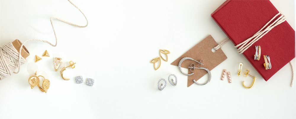 Diamond jewelry, stud earrings, gold hoop earrings, and diamond stud earrings