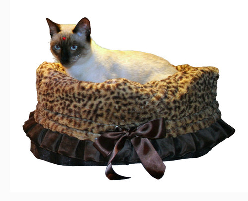 3-In-1 Reversible Cheetah Snuggle Bug functions as a pet bed, a car seat or a shoulder tote.
