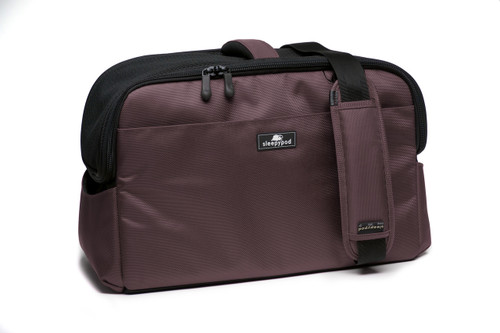 Chocolate Brown Sleepypod Atom Airline Approved Pet Carrier features adjustable shoulder straps for shoulder carry and a built-in handle for hand carry.