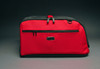 Shown with left side compressed -Sleepypod Air Red Airline Approved Pet Carrier