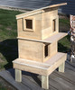 Penthouse outdoor feral cat shelter house version (2-level) shown on OPTIONAL Extra Wide Stand
