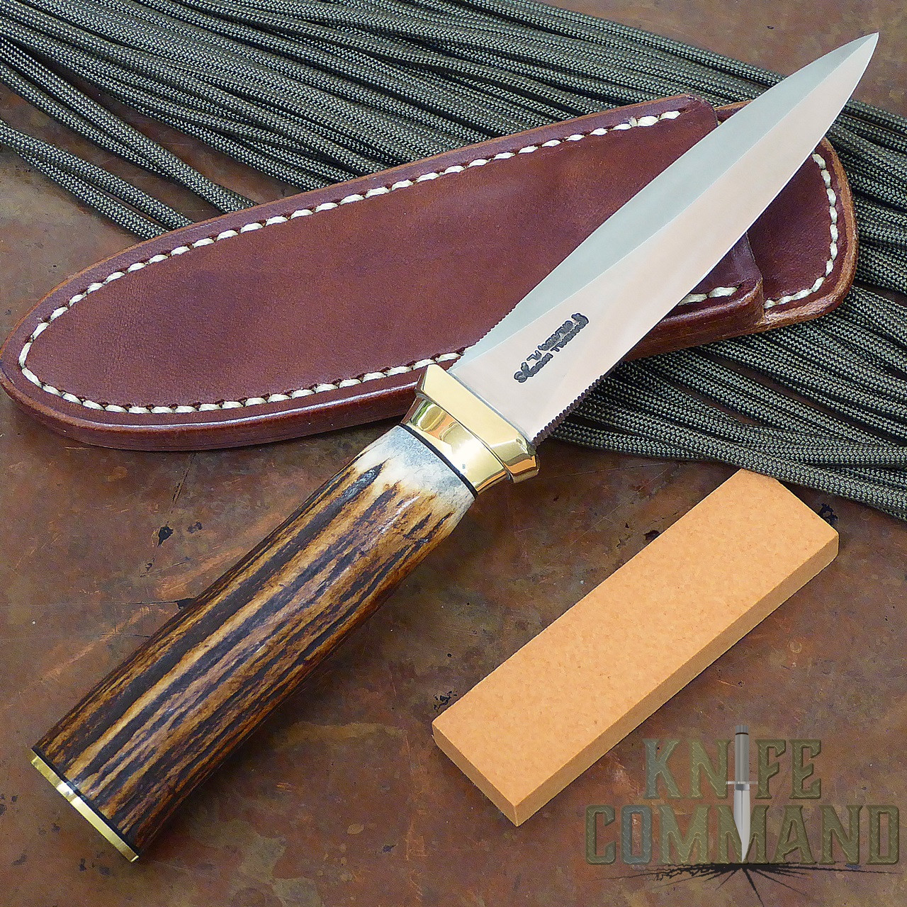 Randall Made Knives Model 24 Guardian Stag Brass Boot Knife.  Brass hilt and smooth brass collar.