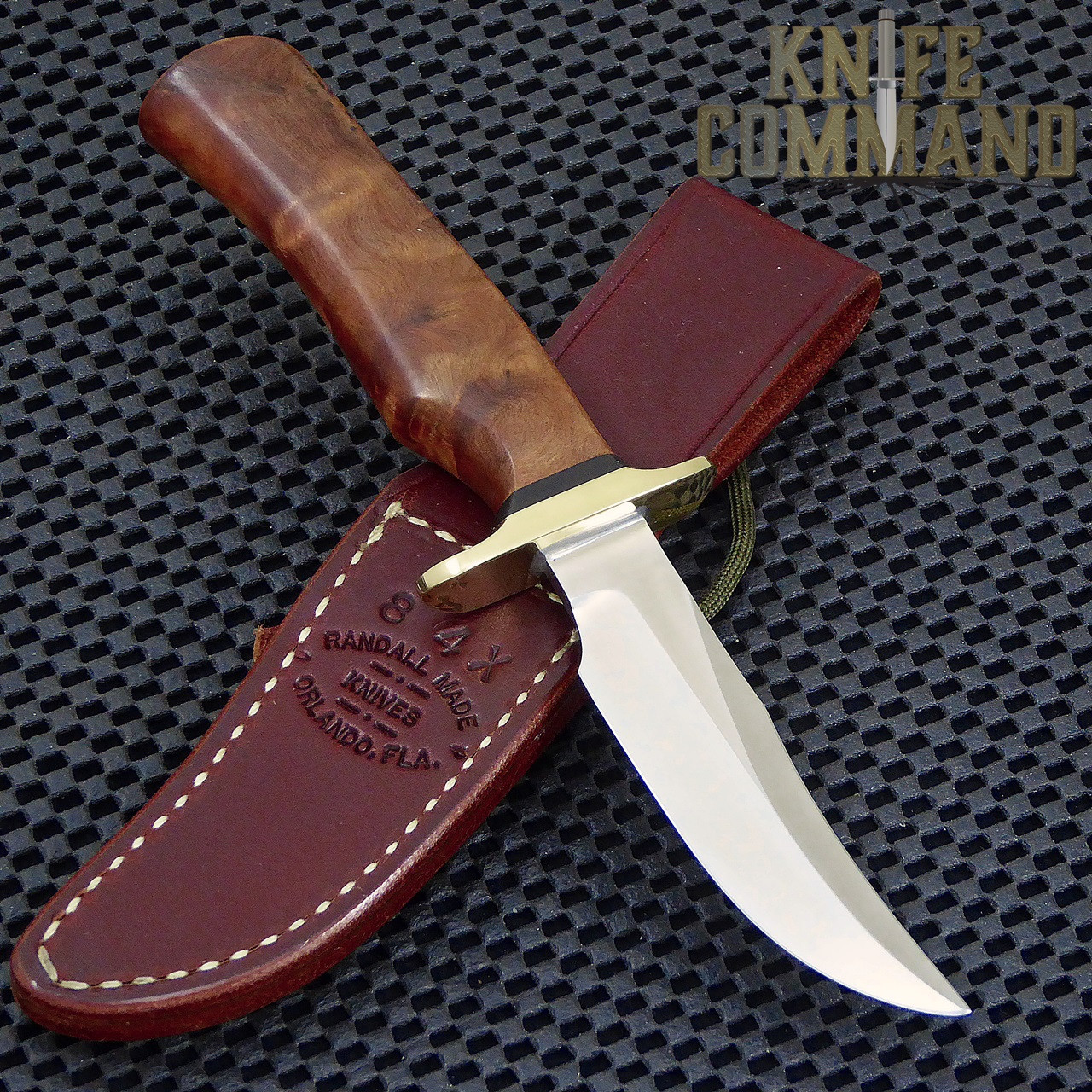 Randall Made Knives Model 8-4X Old Style Bird and Trout Thuya Fighter Style Knife.  Single finger grip and a double hilt.