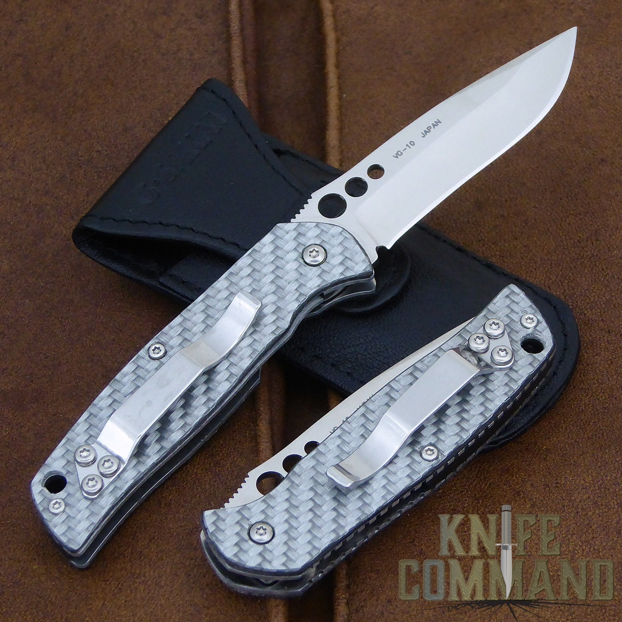 G Sakai Rip White Glass Carbon Fiber Pocket Knife 11166.  Carry with pocket clip or leather pouch.