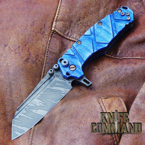 Wander Tactical Custom Mistral Blue Maple TI Extreme Duty Folding Knife Ice Brush.  Blue Maple with bronzed hardware.