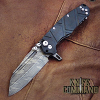 Wander Tactical Custom Mistral Ebony TI Extreme Duty Folding Knife Ice Brush.  Dark Ebony wood handles with polished hardware.