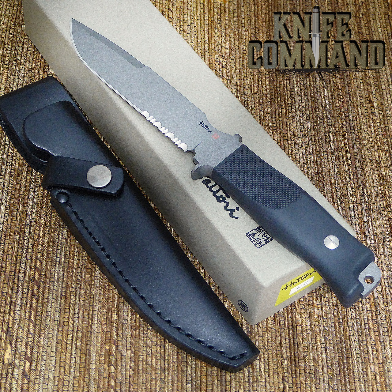 Hattori Knives Model S-51 Sea Commander Combat Military and Dive Knife.  Textured rubber handle with exposed tang/lanyard hole.