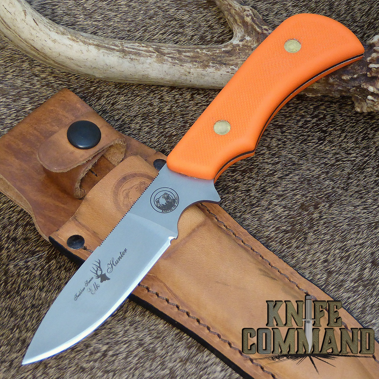 D2 blade and Blaze Orange Suregrip handle.