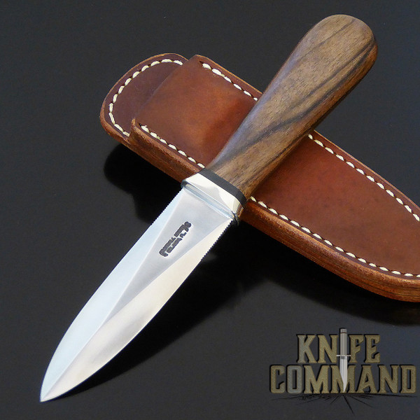 Walnut and nickel silver.