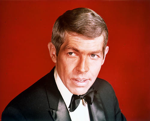 This is an image of 259342 James Coburn Photograph & Poster