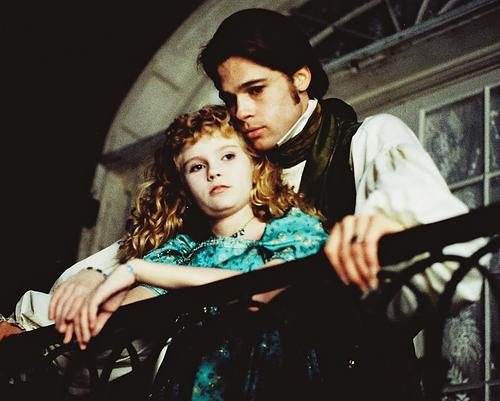 This is an image of 215032 Brad Pitt & Kirsten Dunst Photograph & Poster