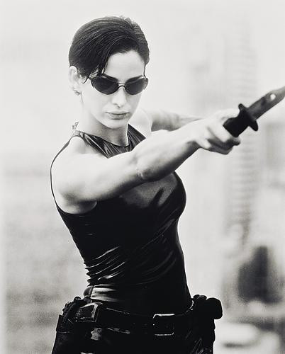 This is an image of 168986 Carrie-Anne Moss Photograph & Poster