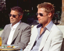 This is an image of 250132 George Clooney and Brad Pitt Photograph & Poster