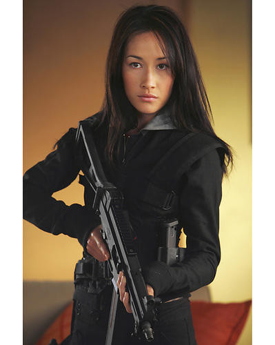 This is an image of 272170 Maggie Q Photograph & Poster