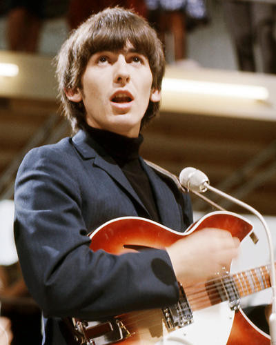 This is an image of Photograph & Poster of George Harrison 292989