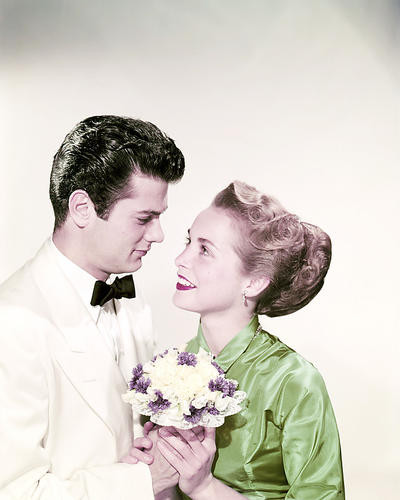 This is an image of Photograph & Poster of Tony Curtis and Janet Leigh 293021
