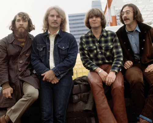 This is an image of Photograph & Poster of Creedence Clearwater Revival 297416
