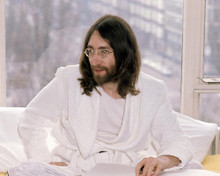 This is an image of Photograph & Poster of John Lennon 286868
