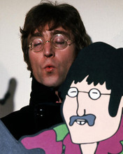 This is an image of Photograph & Poster of John Lennon 286921