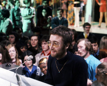 This is an image of Photograph & Poster of John Lennon 286927