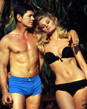 This is an image of Photograph & Poster of Charles Bronson and Jill Ireland 287142