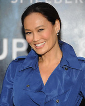 This is an image of Photograph & Poster of Tia Carrere 287831