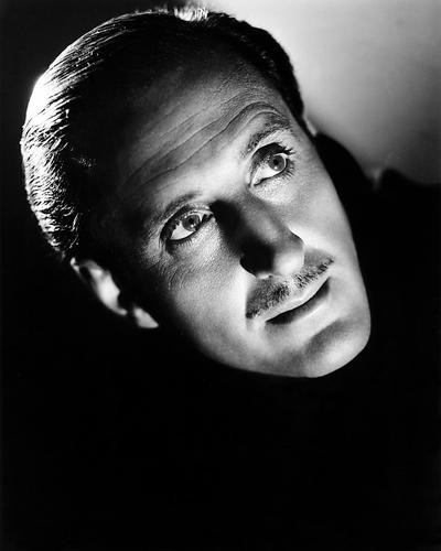 This is an image of Photograph & Poster of Basil Rathbone 197034