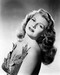 This is an image of Photograph & Poster of Rita Hayworth 197346