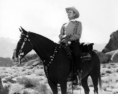 This is an image of Photograph & Poster of Gene Autry 197331