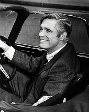 This is an image of Photograph & Poster of George Peppard 197537