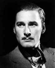 This is an image of Photograph & Poster of Errol Flynn 199468
