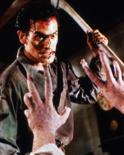 This is an image of 280748 Bruce Campbell as Ashley 'Ash' J. Williams in Evil Dead II