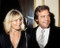 This is an image of 282776 Lee Majors and Linda Evans Photograph & Poster