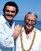 This is an image of 288547 Perry Como and Burt Reynolds Photograph & Poster
