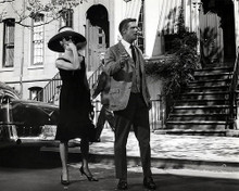 This is an image of 190691 Audrey Hepburn and George Peppard Photograph & Poster