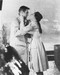 This is an image of 172683 Audrey Hepburn & George Peppard Photograph & Poster