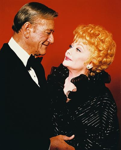 This is an image of 231182 John Wayne & Lucille Ball Photograph & Poster