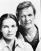 This is an image of 171456 Roger Moore & Carole Bouquet Photograph & Poster