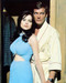 This is an image of 252509 Roger Moore & Madeline Smith Photograph & Poster