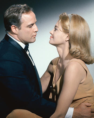 This is an image of 254285 Marlon Brando and Angie Dickinson Photograph & Poster