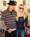This is an image of 255178 Pamela Anderson and Kid Rock Photograph & Poster