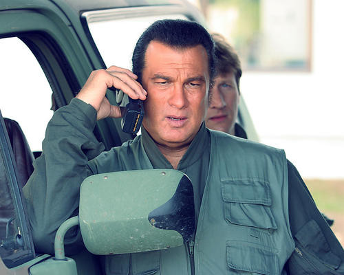 This is an image of 275532 Steven Seagal Photograph & Poster