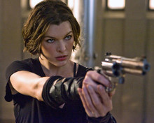 This is an image of 282641 Milla Jovovich Photograph & Poster